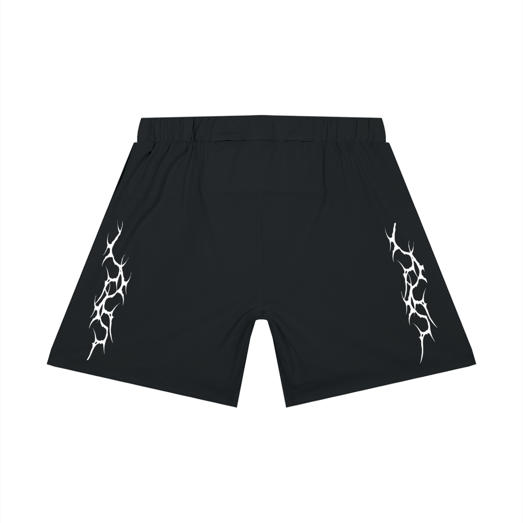 Black shorts with white tribal designs on a white background