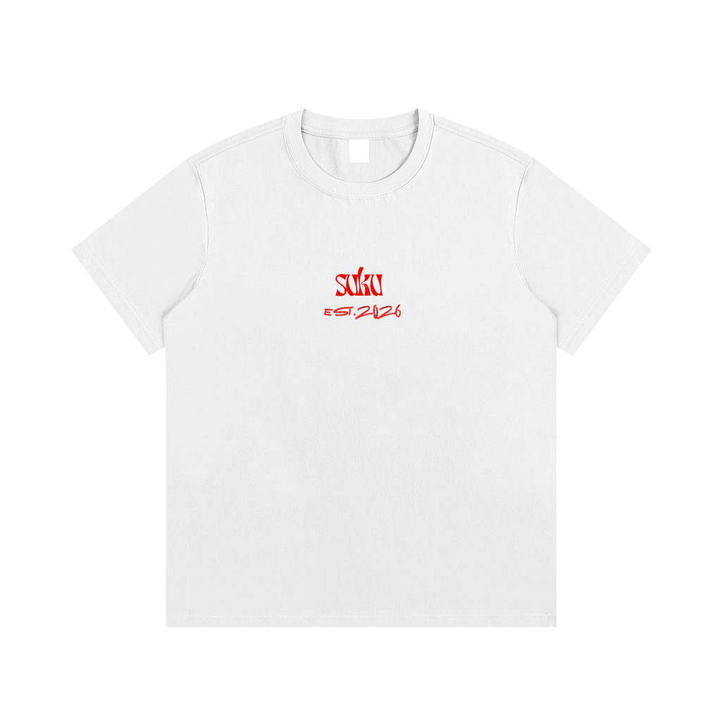 White Suku Essential Cotton T-Shirt with oversized fit, crew neck, bold red logo on the chest, made from soft premium cotton.