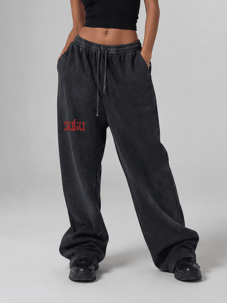 Women’s vintage washed waist pants by Suku featuring a relaxed fit, high waist, and classic denim style.