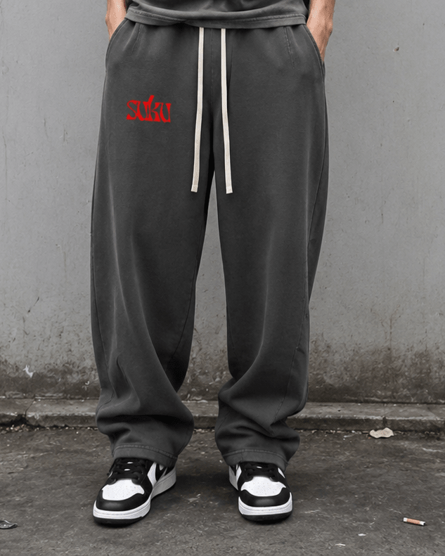 Suku mineral wash barrel leg pants with a relaxed fit, featuring a faded wash and casual style in soft, comfortable fabric.